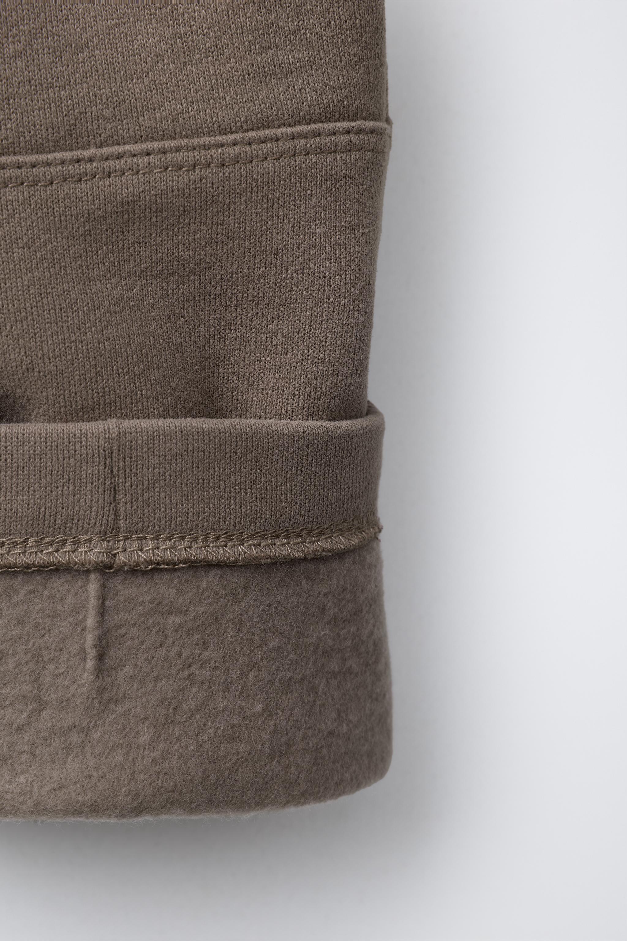 PANTALON EN MOLLETON DROIT AVEC LOGO RELIEF